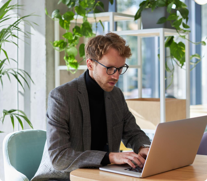 amenworking on his laptop